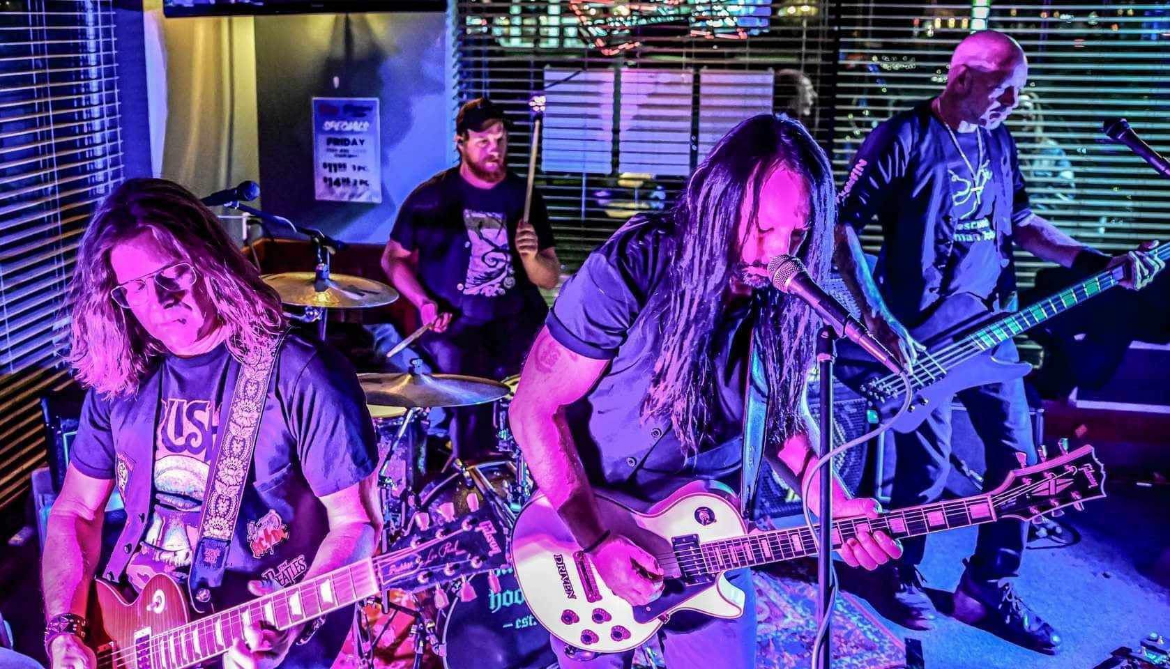 Live band playing at Pitcher's Sports Bar