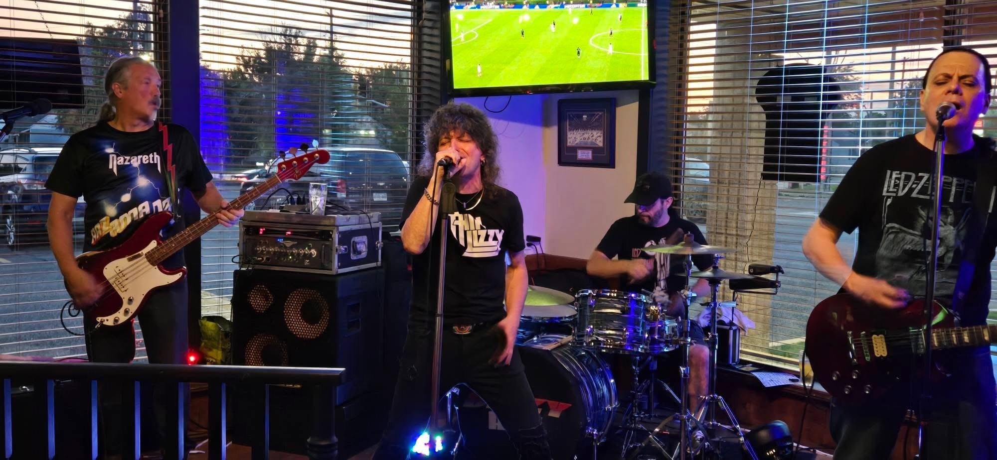 Tribute band performing at Pitcher's
